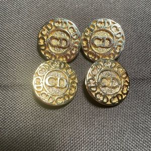 Authentic Christian Dior buttons. Set of 4